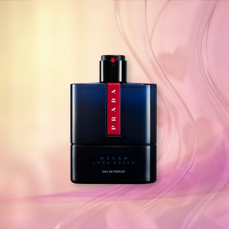 Bottle of Prada Beauty Luna Rossa Ocean Eau de Parfum on a pink textured background