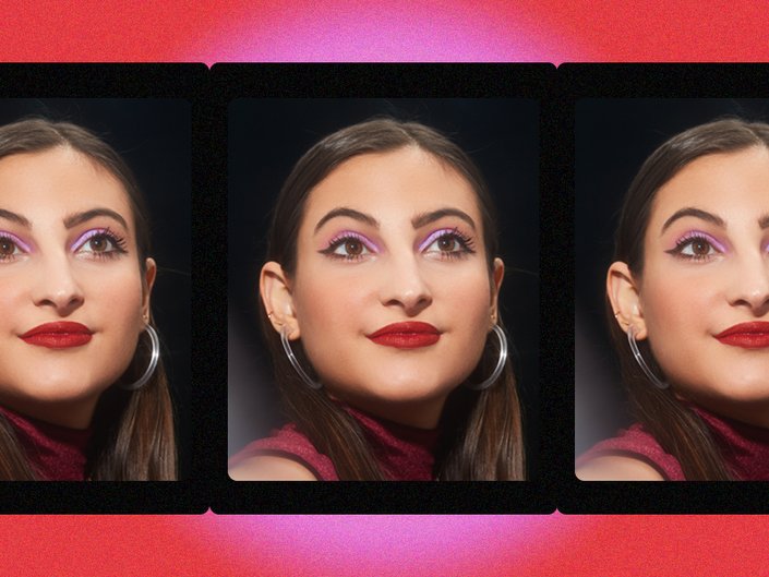 person wearing pink eyeshadow and red lipstick