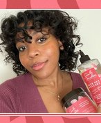 Person holding Carol’s Daughter Jelly to Cream Conditioner on a graphic pink and red background 