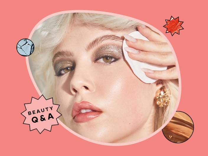 person removing glitter makeup from their eye area