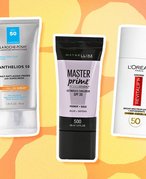 Image of the La Roche-Posay Anthelios Daily Anti-Aging Face Primer with SPF 50 Sunscreen, Maybelline New York FaceStudio Master Prime Blur + Defend Primer and L'Oréal Paris Revitalift Derm Intensives Broad Spectrum SPF 50 Invisible UV Fluid on a graphic orange background 