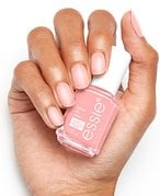 Close-up image of Essie Sugar Daddy nail polish and others