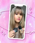 Pink watercolor background with a collage of a person holding a powder puff and Giorgio Armani Beauty Luminous Silk Foundation.