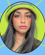 Image of a black-haired woman with freckles on a blue and green graphic background